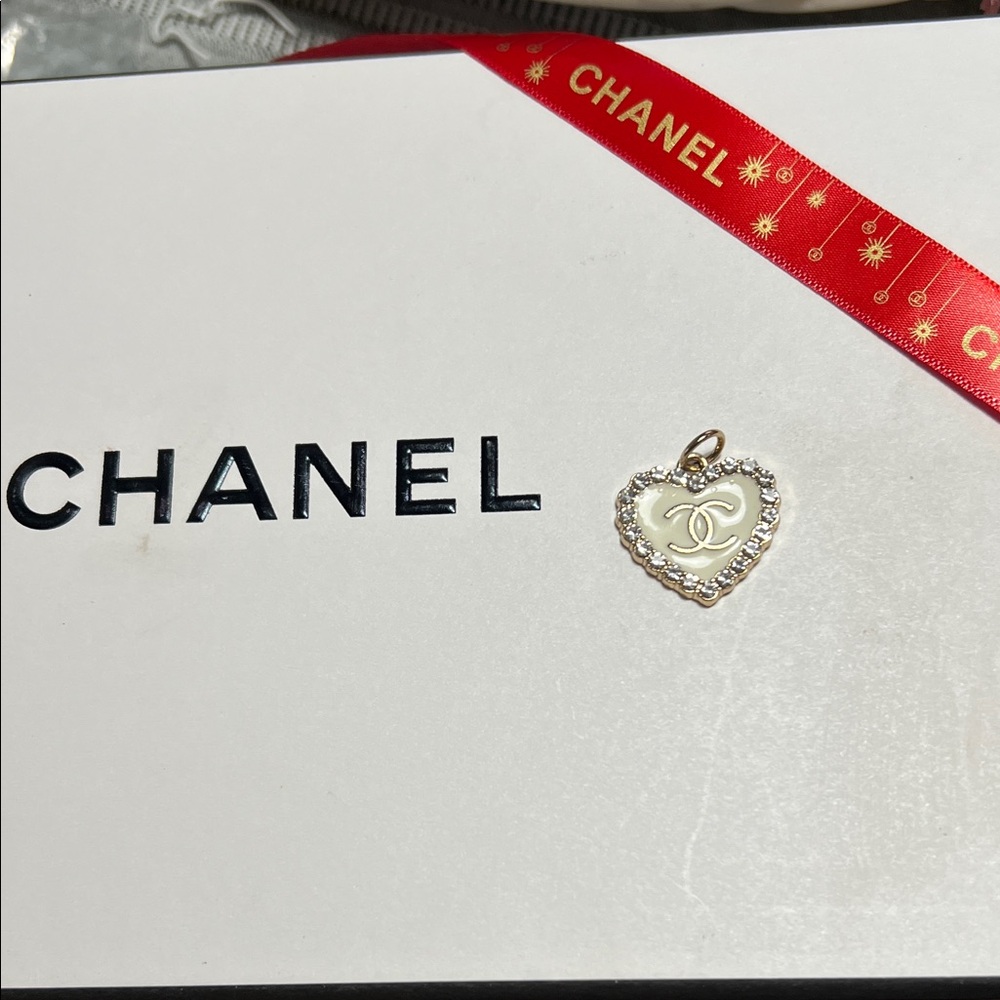 CHANEL white and gold crystal Heart pendant